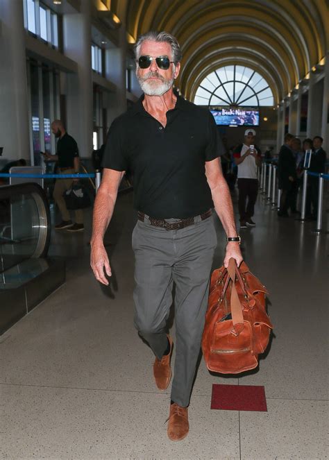 pierce brosnan nails airport style time and time again most stylish men mens fashion casual