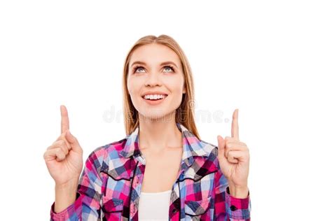 Portrait Of Smiling Happy Girl Pointing Up With Fingers Stock Image