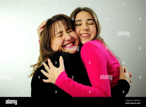 Mom And Daughter Are Hugging They Have A Lot Of Tenderness And Love For Each Other They Strongly