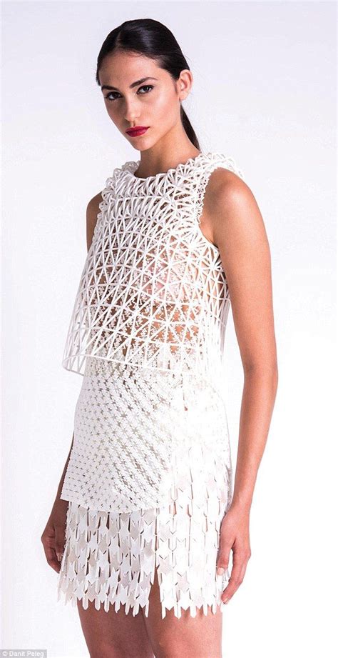 Intricate Detailing On The Layered Top And Skirt Was Created Using