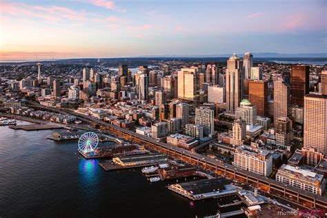 Aerial View Of Seattle Downtown And The Great Wheel At Sunset Usa