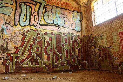 Graffiti On Wall In Abandoned Factory