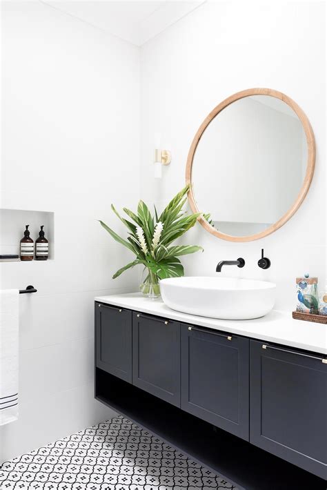 Shop for brass vanity lights and the best in modern furniture. Black and white encaustic look tiles, Dulux Domino vanity ...