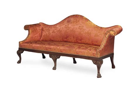 A George Iii Style Mahogany Camelback Sofa