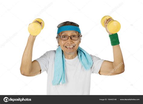 Happy Old Man Lifting Two Dumbbells Stock Photo Realinemedia