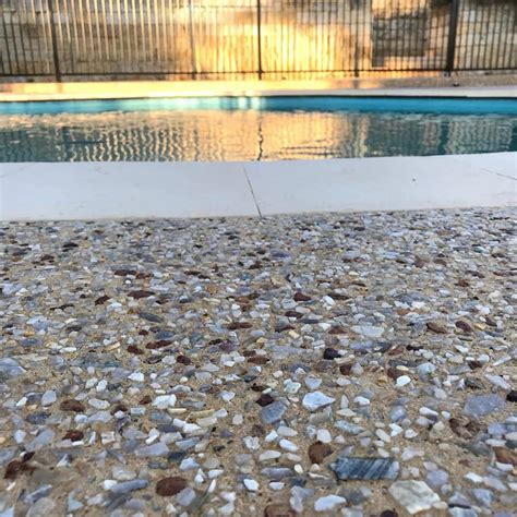 Exposed Aggregate Pool Surrounds Seamless Concrete