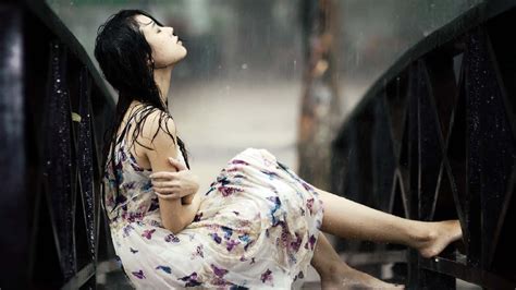 Download Girl Sitting Alone Crying In Rain Wallpaper