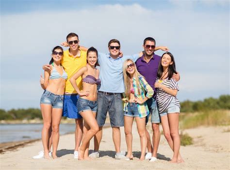 Group Of Friends Having Fun On The Beach Stock Photo Image