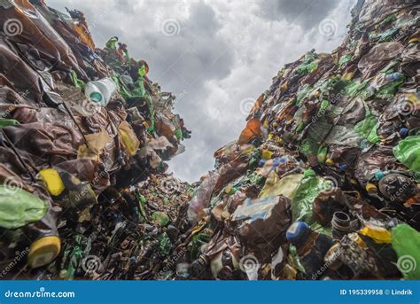 Mountains Of Plastic Bottles In A Landfill For Recycling Stock Photo