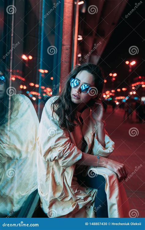 Night In The City Beautiful Woman Among Red Lights Stock Photo