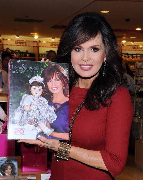 marie osmond celebrates 20th anniversary of signature doll collection with doll signing at