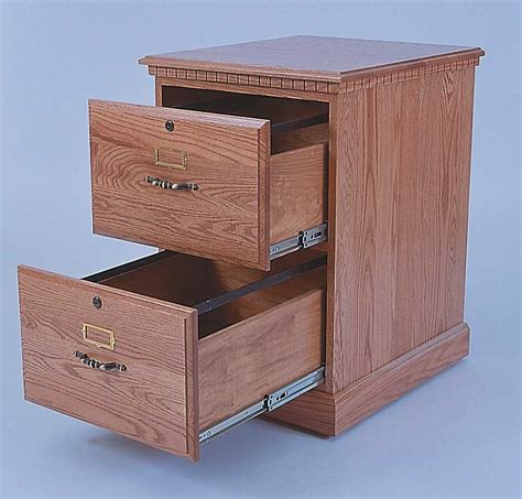 Wooden file cabinets utilizing pendant hangs on rear door. Wood Filing Cabinet 2 Drawer Ideas