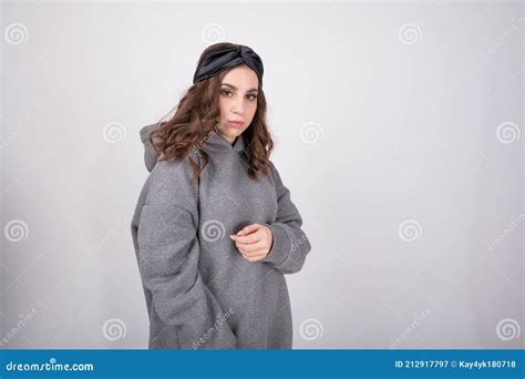 Portrait Of Cute Teenage Girl With Brown Hair Wearing Warm Oversized Hoodie Woman Wear Stylish
