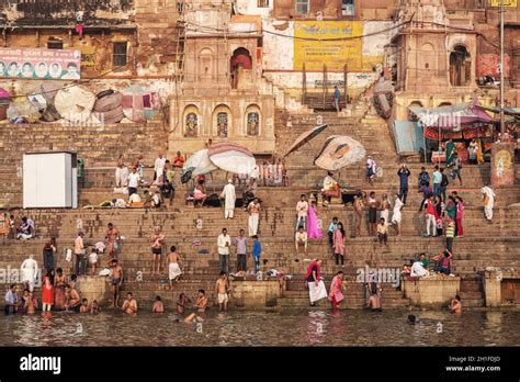 Hindu Pilgrims Take Holy Bath In The River Ganges On The Auspicious