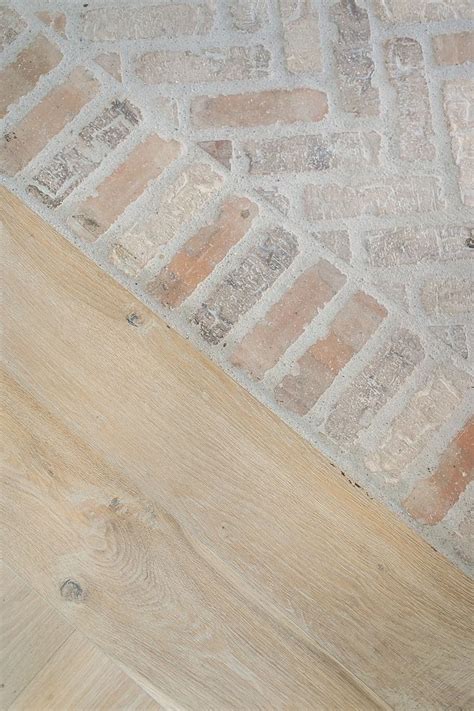 Brick Installed In Herringbone Pattern With A Soldier