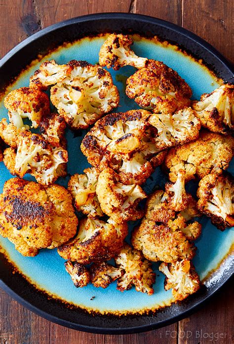 Roasted cauliflower isn't the sort of recipe that makes people jump up and down with excitement. Roasted Cauliflower with Tahini Sauce and Pomegranate Molasses - i FOOD Blogger