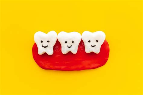 Oral Health Concept Healthy And Caries Teeth Models On Gums Stock