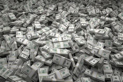 Pile Of Money Stock Photos Pictures And Royalty Free Images Istock