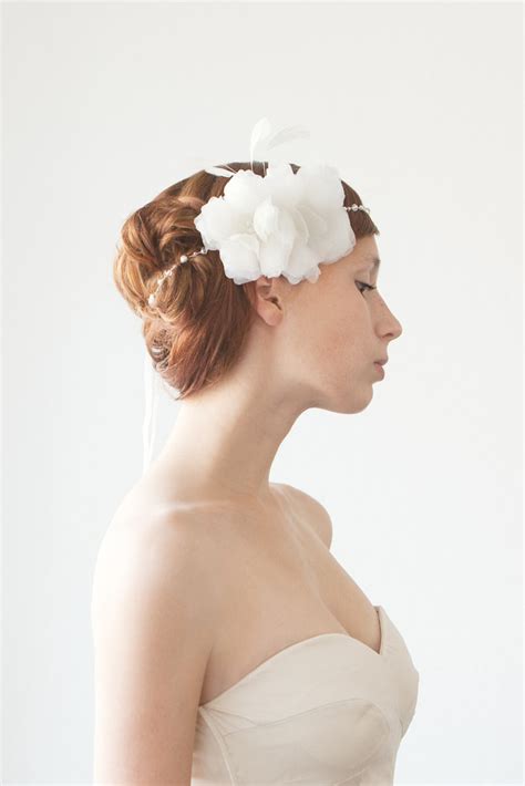Maybe you would like to learn more about one of these? These Bridal Hair Flowers Make Perfect Veil Alternatives ...