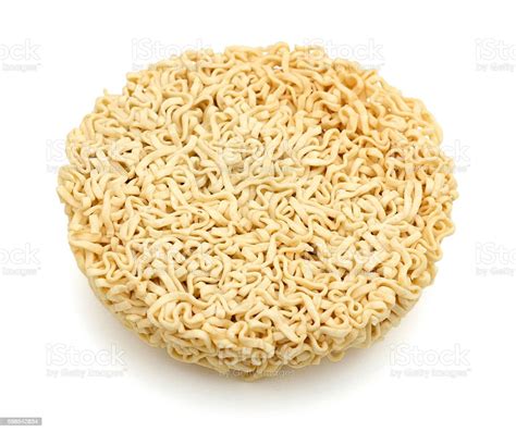 Round Of Uncooked Ramen Noodles Isolated On White Stock Photo - Download Image Now - iStock