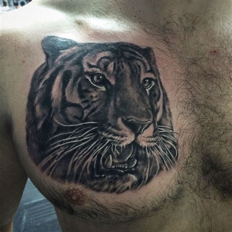 tiger-tattoo-on-chest-tiger-tattoo,-animal-tattoo,-tattoo-work