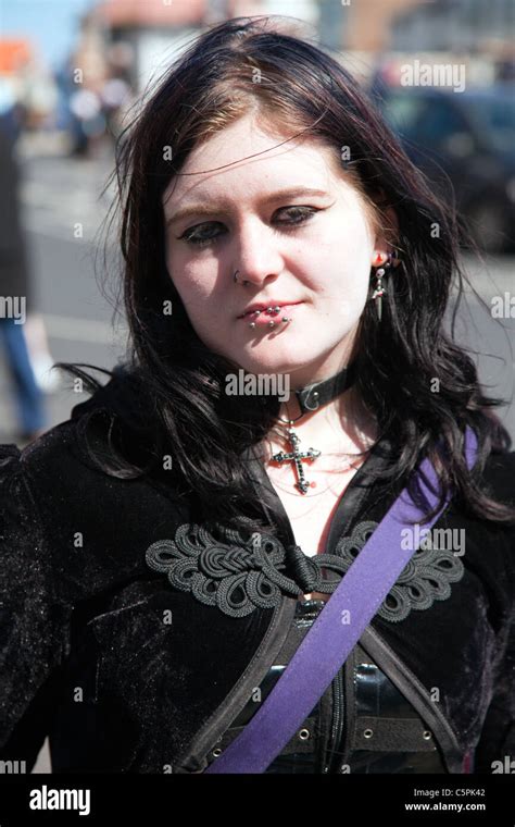 whitby yorkshire england goth gothic teen girl with piercings in lip emo angst with crucifix