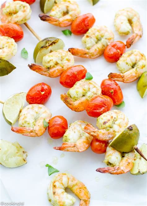 Adding pieces of vibrant vegetables like bell pepper and red onion add a pop of color and shrimp cook very quickly, so you'll have to watch your shrimp to make sure they don't overcook. Easy Pesto Shrimp Skewers On The Grill