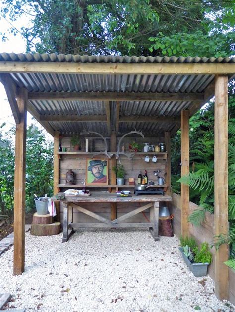 Covered outdoor stone kitchen with patio dining area. The ultimate garden or allotment shelter. I shall be making this with transparent corrugated ...