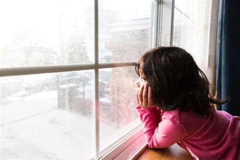 Best Girl Looking Out Window Stock Photos Pictures And Royalty Free