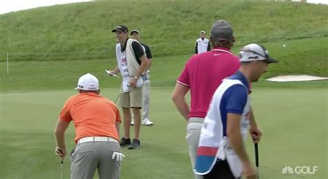 Golfer Throws Putter Into The Water So His Mom Wades In To Get It