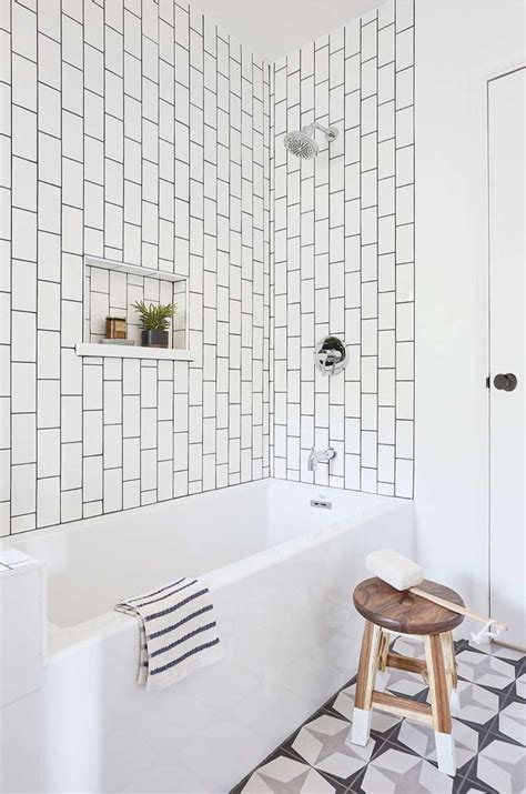 Transform Your Bathroom With A Chic White Subway Tile Shower And Light Gray Grout Get Inspired