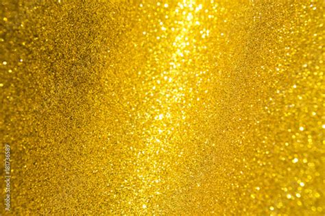 Abstract Background Of Shiny Gold Glitter Selective Focus Stock Photo