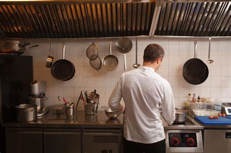Professional Chef Cooking At The Kitchen Stock Image Image Of Frying