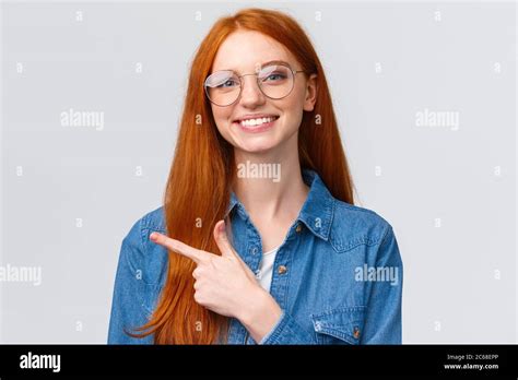 Close Up Portrait Cute Cheerful Redhead Foxy Girl In Glasses Showing