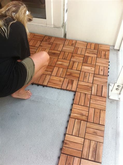 Click the image for larger image size and more details. Ikea...interlocking wood tiles to redo the floor ...
