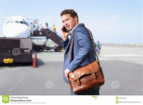 Airport Business Man On Smartphone By Plane Stock Image Image Of