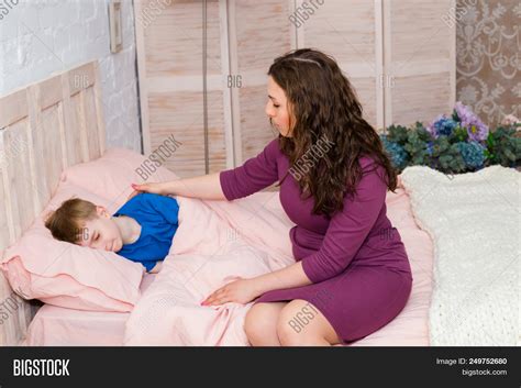 Mum Puts Bed Son Image And Photo Free Trial Bigstock