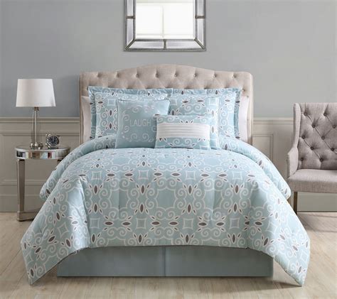 Sometimes a lightweight bedspread isn't warm enough and needs to be replaced with a queen or king comforter set on chilly nights and mornings. 7 Piece Lonnie Spa/White Comforter Set