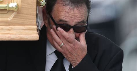 Barry Chuckle Funeral Brother Paul Wipes Away Tears As He Carries Coffin Into Rotherham United
