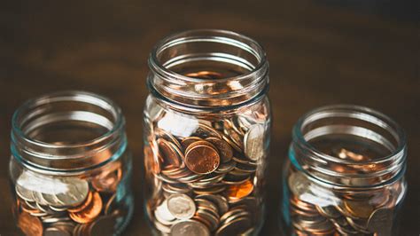Maybe you would like to learn more about one of these? Money Jars Filled With American Currency Savings And Donations Concept Stock Photo - Download ...