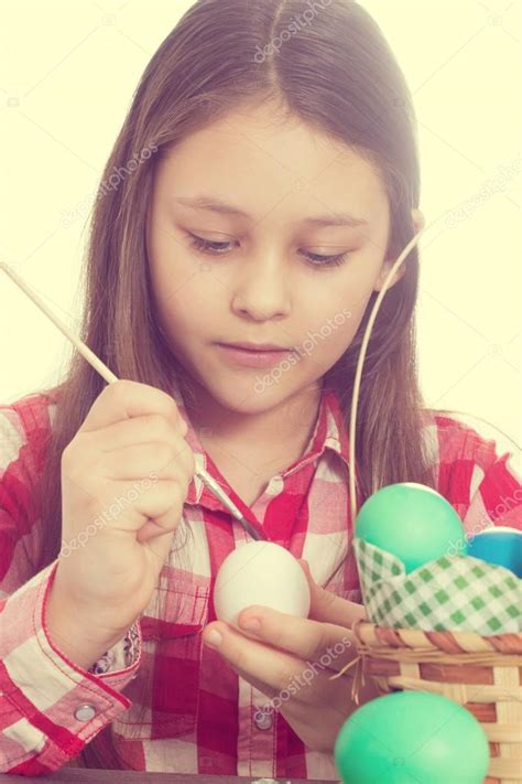 Girl Paints Easter Eggs Stock Photo By ©gurinaleksandr 101084418