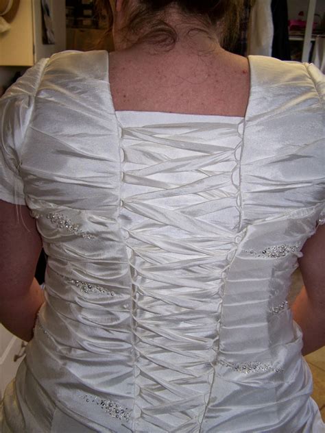 I bought this dress for a winter wedding and got so many compliments. sewcreatelive: Altering a Wedding dress--Adding Shoulders ...