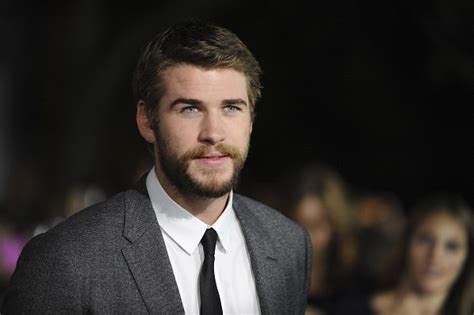 Liam Hemsworth Miley Cyrus Split Hunger Games Actor Kissing Random
