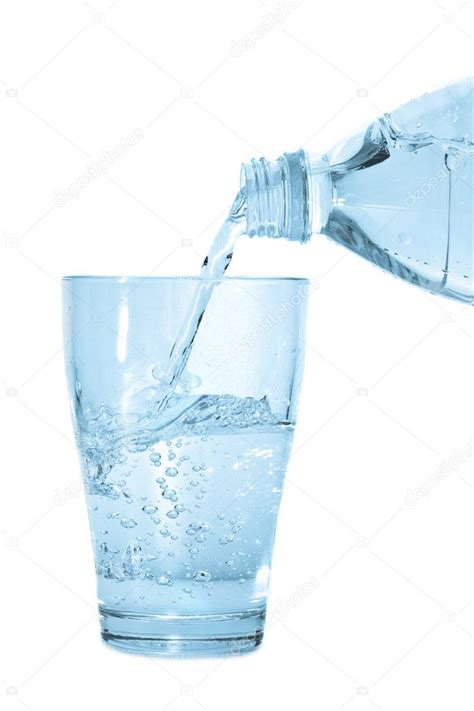 Water Pouring From Bottle Into Glass — Stock Photo © Pkirillov 1152393