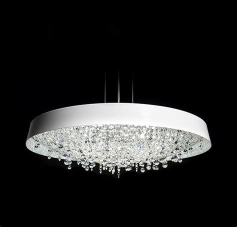 Crystal is the perfect light for dining tables and counters. Tondo Crystal Pendant Lamp | Manooi Crystal Chandeliers