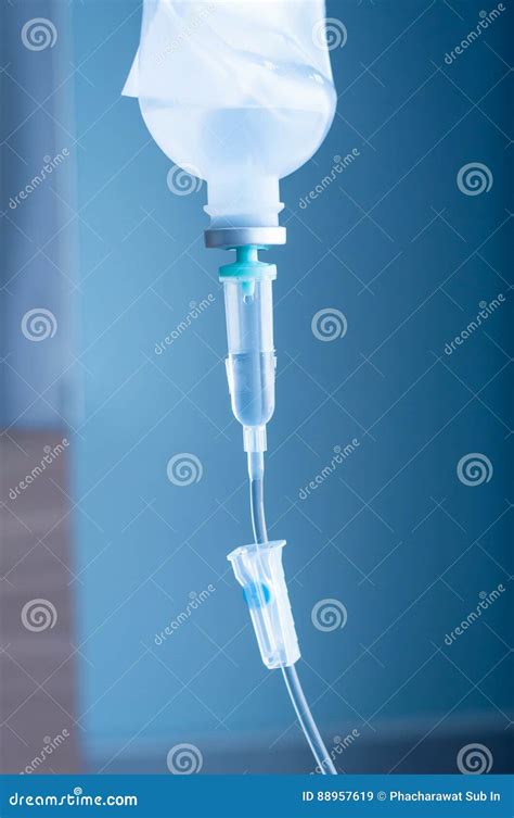 Saline Iv Drip For Patient And Infusion Pump In Hospital Stock Image