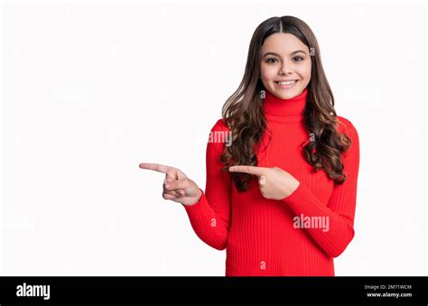 Teen Girl Pointing Finger On Copy Space In Studio Young Teen Girl