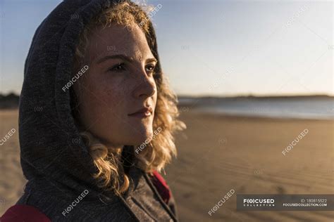 Teenage Girl Looking Sideways At The Beach — Selective Focus