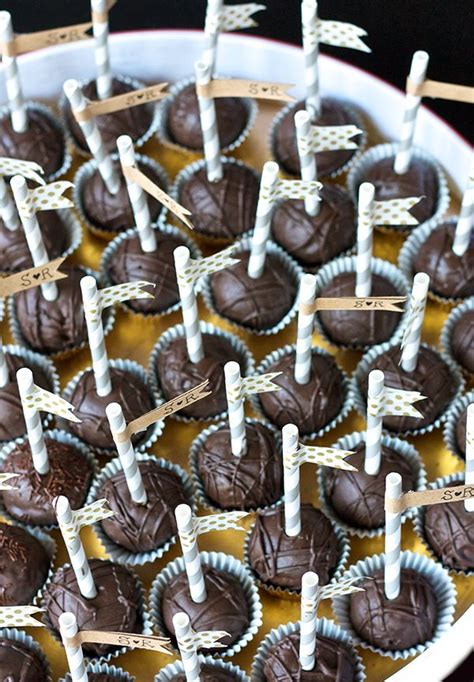 The bottom tier being 3' square and about 2' tall and the top being 2' cubed. Cookie Dough Filled Cake Pops | These look delicious for big gatherings.