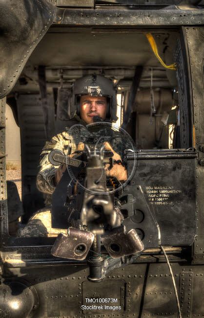 Hdr Image Of A Uh 60 Black Hawk Door Gunner Manning A M240 Machine Gun